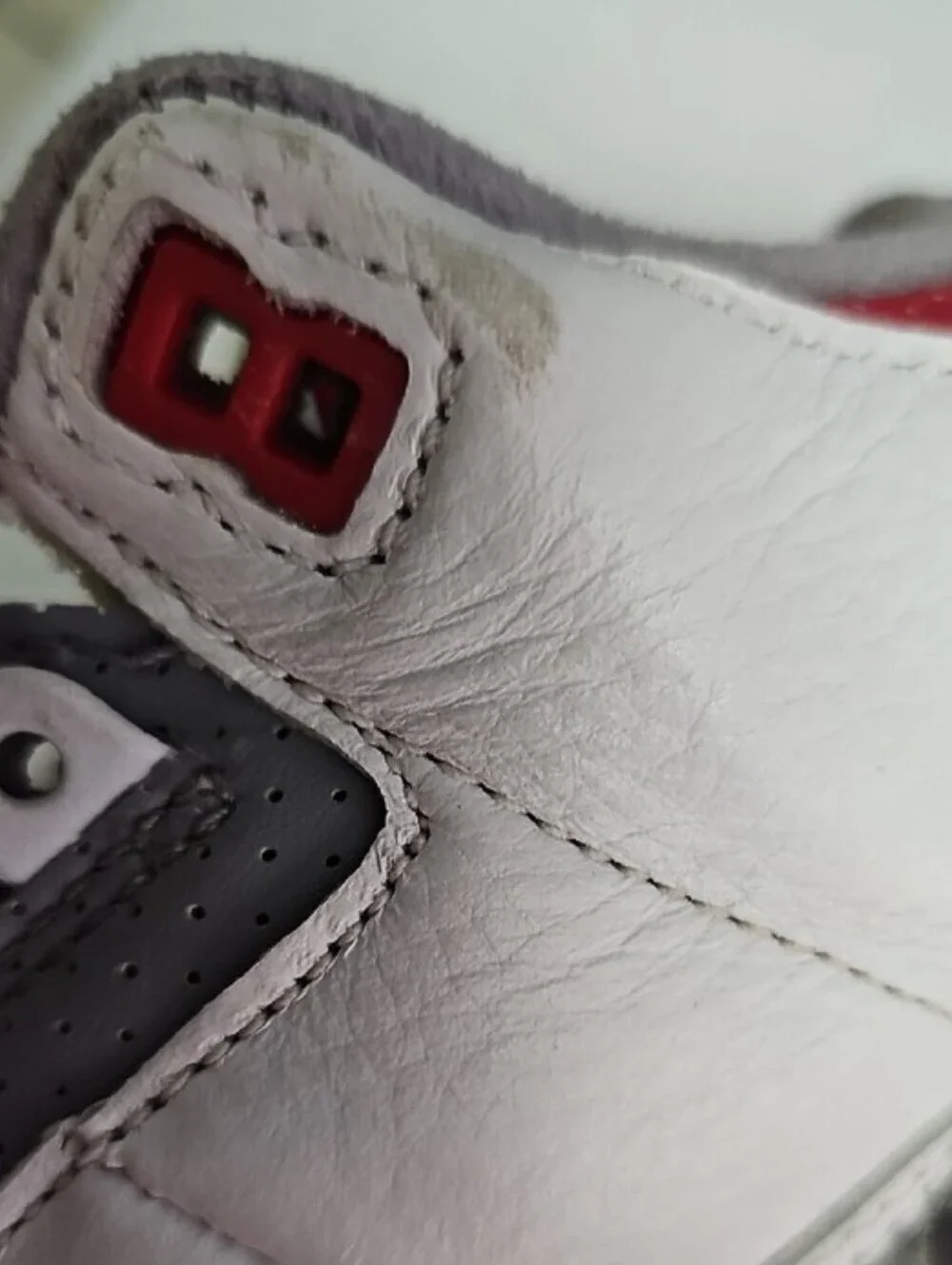 Jordan Men’s White/Gray/Red Retro Sneakers